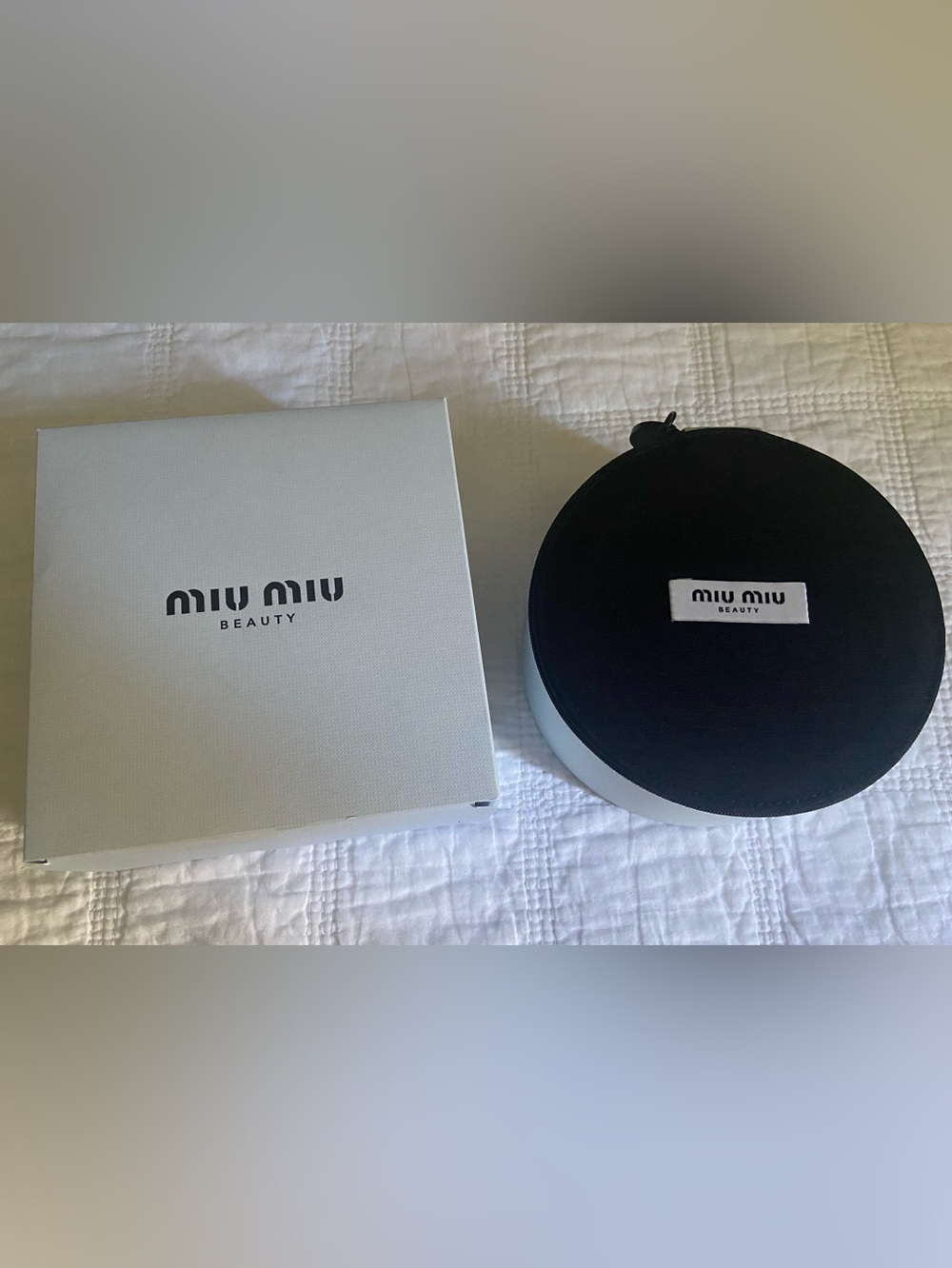 Miu Miu Black and White Round Travel Case